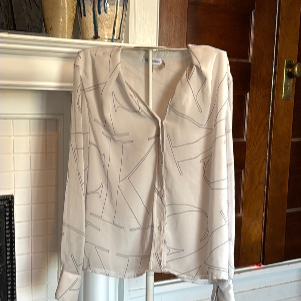 Calvin Klein monogram‎  Blouse . Worn about 5 times. 89 retail- lined.
